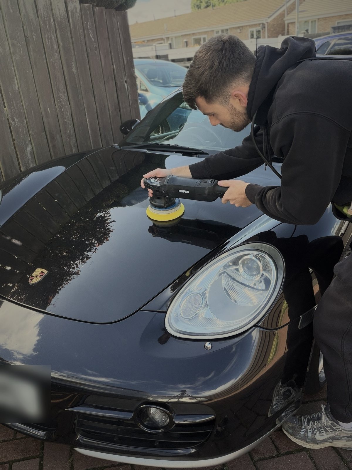 Machine polishing a Porsche by ARDEN Vehicle Care
